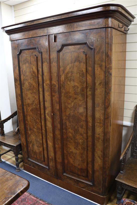 A late Victorian burr walnut two door wardrobe W.157cm